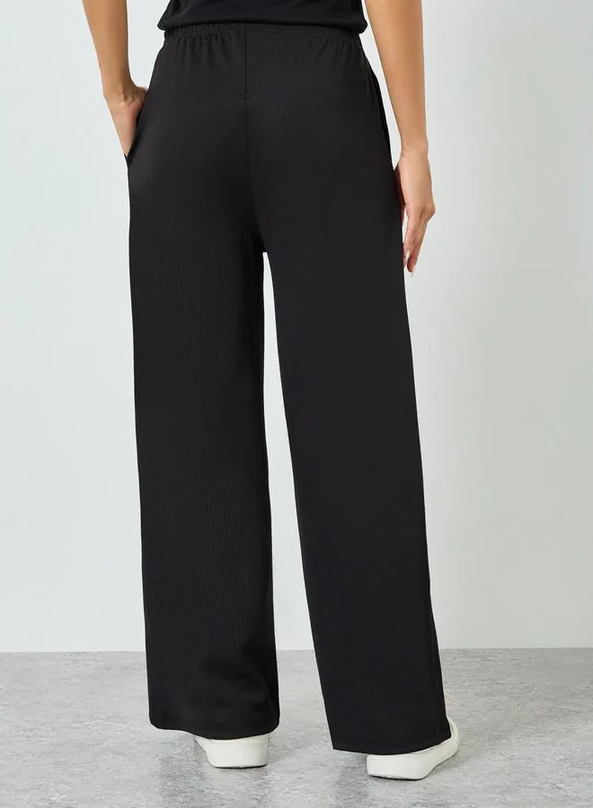 Styli black Black Relaxed Fit Elastic Waist Joggers for Women | Best Price UAE
